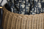 BUCKET BAG 19 IN BLACK OBLIQUE JACQUARD AND BEIGE WICKER