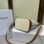 BUCKET 30 IN WHITE TRIOMPHE CANVAS AND RED BROWN CALFSKIN TRIM