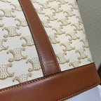 BUCKET 30 IN WHITE TRIOMPHE CANVAS AND RED BROWN CALFSKIN TRIM
