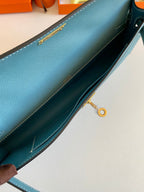 KELLY CUT 31 IN AZURE BLUE CALFSKIN WITH GOLD HARDWARE