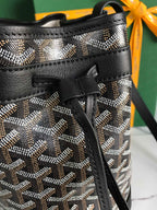 PETIT FLOT BUCKET BAG 22 IN BLACK GOYARDINE CANVAS AND LAMBSKIN TRIM