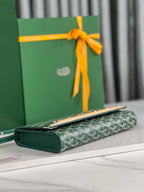 MONTE-CARLO PM CLUTCH 25 IN GREEN GOYARDINE CANVAS