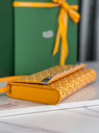 MONTE-CARLO PM CLUTCH 25 IN YELLOW GOYARDINE CANVAS