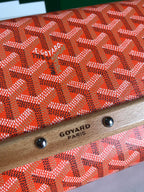 MONTE-CARLO PM CLUTCH 25 IN ORANGE GOYARDINE CANVAS