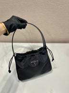 PRADA SMALL DRAWSTRING BAG 23 IN BLACK RE-NYLON