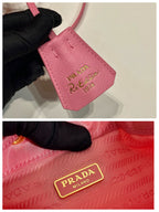 BUCKET BAG 19 IN CANDY PINK RE-NYLON AND SAFFIANO LEATHER HANDLE