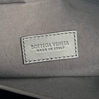 INTRECCIATO CLUTCH 26 IN BLACK CALFSKIN
