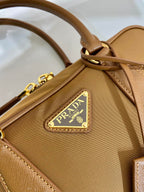 PRADA SMALL TOP HANDLE BAG 25 IN GOLDEN BROWN NYLON AND CALFSKIN TRIM