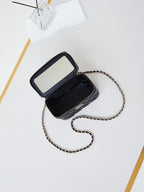 CHANEL 25S MINI VANITY BAG 16 CM IN BLACK LAMBSKIN WITH CRYSTAL-EMBELLISHED  LOGO