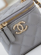 CHANEL 25S MINI VANITY BAG 11 CM IN GREY LAMBSKIN WITH CRYSTAL-EMBELLISHED  LOGO