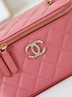CHANEL 25S MINI VANITY BAG 16 CM IN PEACHY PINK LAMBSKIN WITH CRYSTAL-EMBELLISHED  LOGO