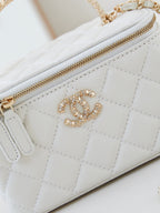 CHANEL 25S MINI VANITY BAG 16 CM IN WHITE LAMBSKIN WITH CRYSTAL-EMBELLISHED  LOGO