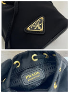 MINI BUCKET BAG 10 IN BLACK RE-NYLON AND SAFFIANO LEATHER STRAP