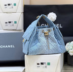 CHANEL 25 HANDBAG IN BLUE 30 DENIM GOLD HARDWARE