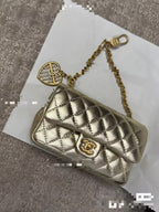 CHANEL CLASSIC FLAP BAG 13 IN GOLD LAMBSKIN WITH PEARL HEART CHARM