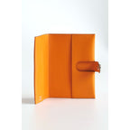 HERM R.M.S Passport Holder in Apricot Evercolor Calfskin