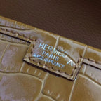 HERM Jige Elan 29 Clutch In Camarel Crocodile Leather
