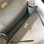 HERM Kelly Pochette Bag In God Epsom Leather