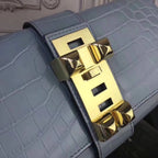 HERM Medor Clutch Bag In Ciel Crocodile Leather