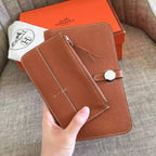 HERM Dogon Duo Wallet In Gold Clemence Leather