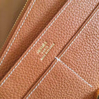 HERM Dogon Duo Wallet In Gold Clemence Leather
