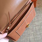 HERM Dogon Duo Wallet In Gold Clemence Leather