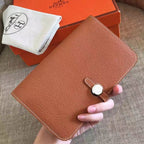 HERM Dogon Duo Wallet In Gold Clemence Leather