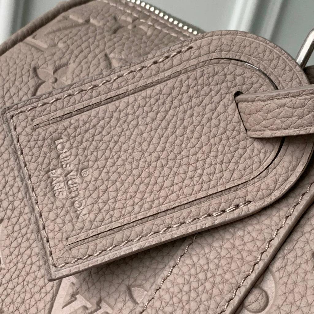 KEEPALL BANDOULIÈRE 34 BAG IN LIGHT BROWN MONOGRAM TAURILLON CALFSKIN