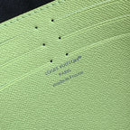 POCHETTE VOYAGE 26 IN LEMON YELLOW MONOGRAM ECLIPSE CALFSKIN