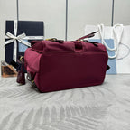 PRADA 25S RE-EDITION 1978 SMALL BACKPACK 28 IN BURGUNDY RE-NYLON