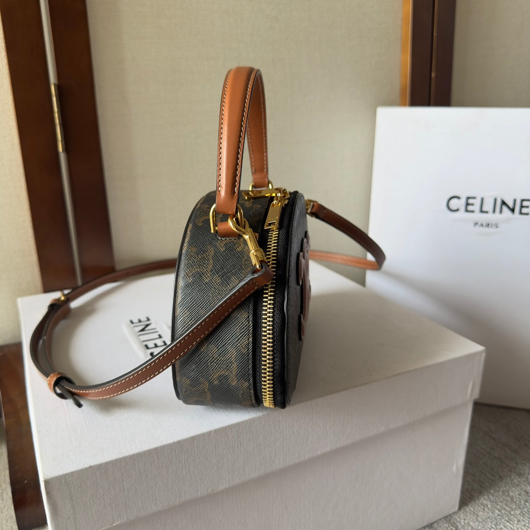 HALF MOON CASE 18 IN BLACK TRIOMPHE CANVAS AND BRONZE BROWN CALFSKIN