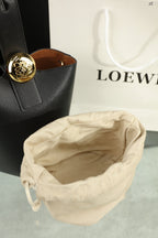 LOE MINI 19 PEBBLE BUCKET IN BLACK MELLOW CALFSKIN