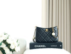 CHANEL 25S HOBO BAG 19.5 CM IN BLACK CALFSKIN WITH GOLD HARDWARE