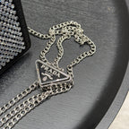 STUDDED CRYSTAL WALLET ON CHAIN 13 IN BLACK CALFSKIN