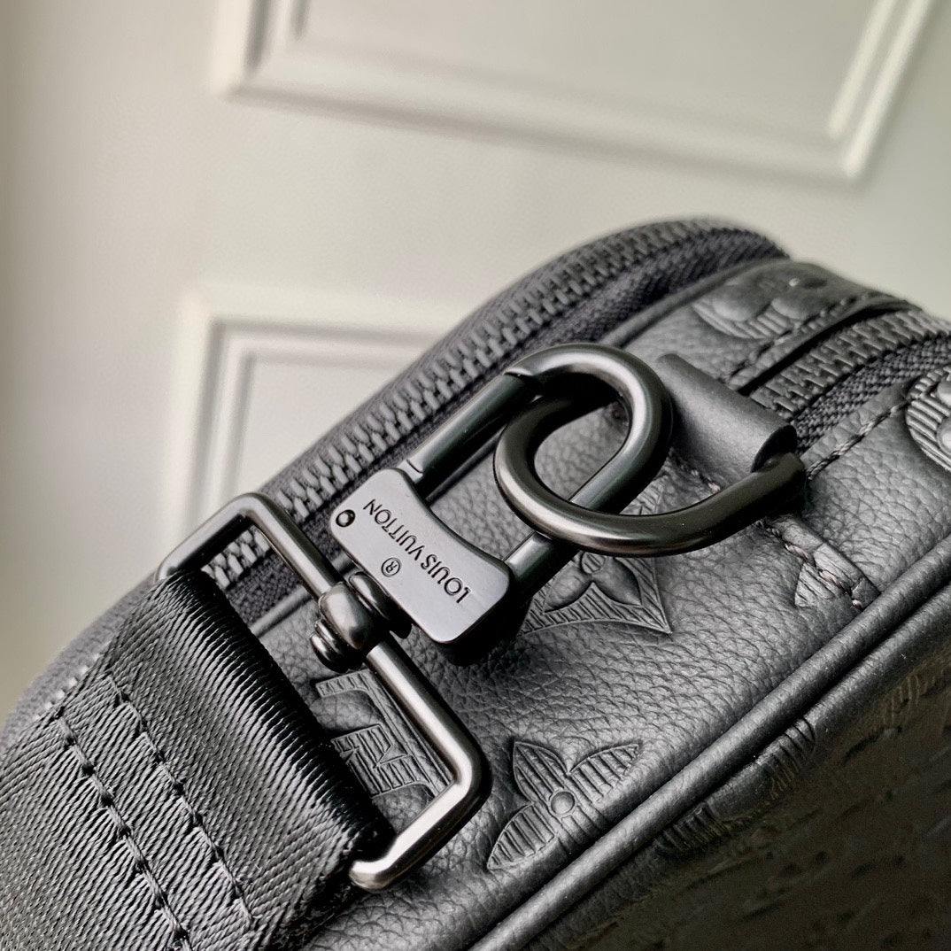 ALPHA NANO BAG 24 IN BLACK MONOGRAM SHADOW EMBOSSED COWHIDE