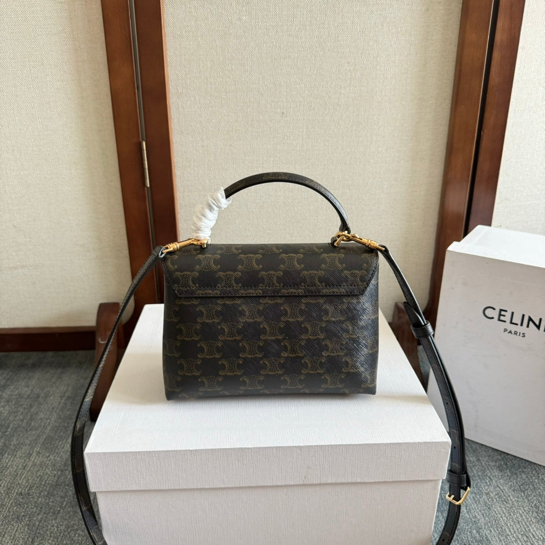 TEEN NINO BAG 20 IN BLACK TRIOMPHE CANVAS GOLD HARDWARE
