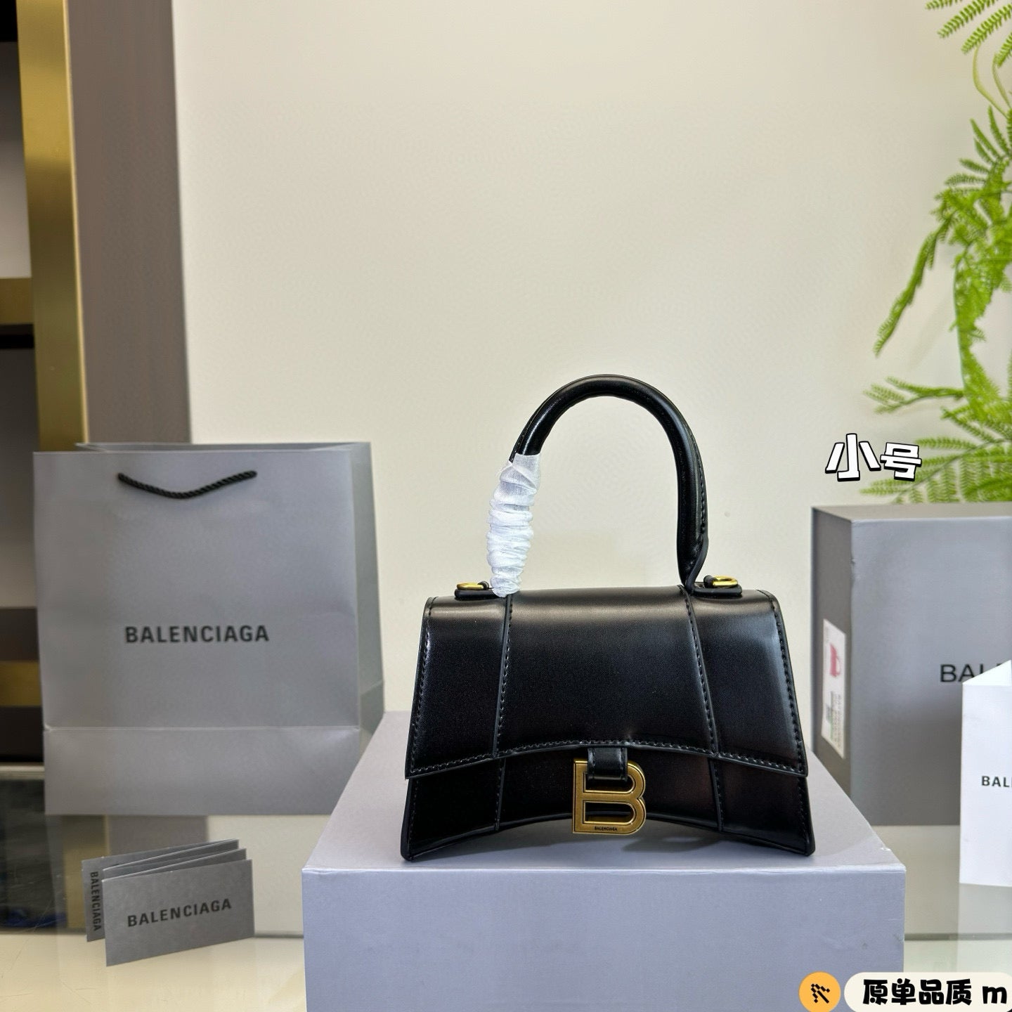 HOURGLASS HANDBAG 19 IN BLACK SHINY BOX CALFSKIN GOLD HARDWARE