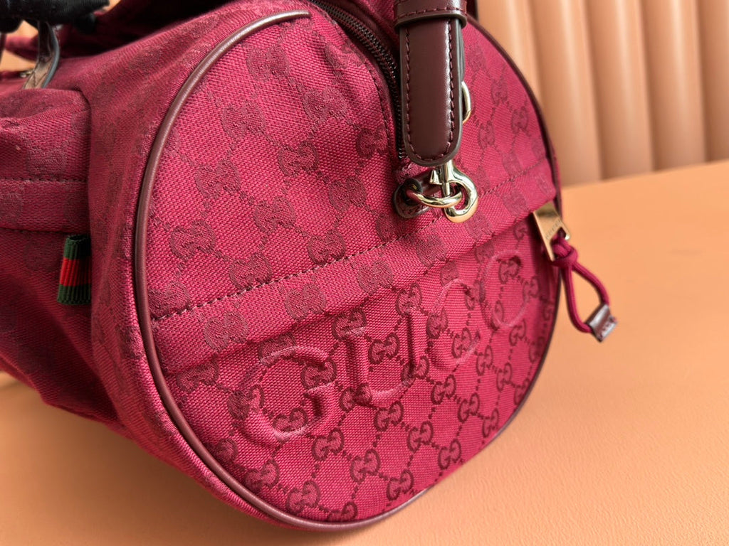 GG SMALL DUFFLE BAG 42 IN ROSSO ANCORA RED GG CANVAS