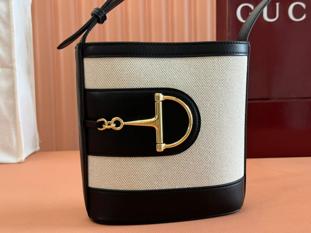 73 SMALL BUCKET BAG 20 IN NATURAL CANVAS AND BLACK CALFSKIN