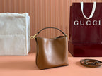 EMBLEM SMALL BUCKET BAG 19 IN BROWN SMOOTH CALFSKIN