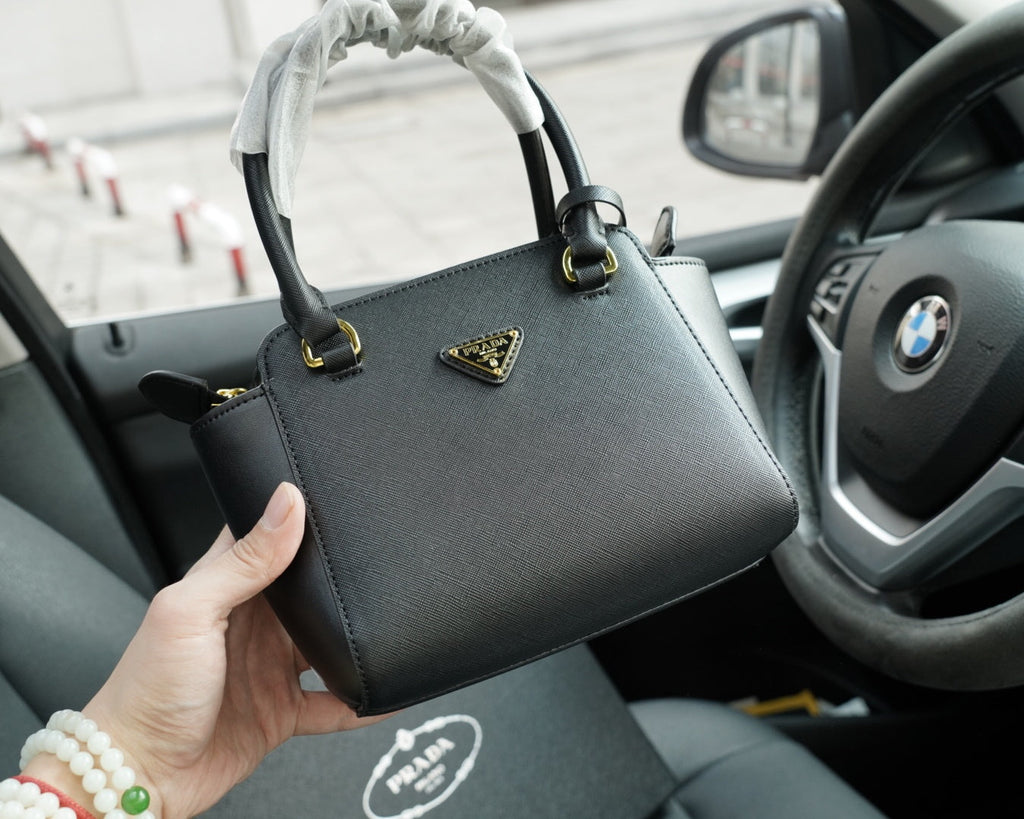 RE-EDITION TOP HANDLE BAG 20 IN BLACK CALFSKIN
