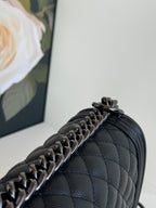 CHANEL BOY 25S 25 CM IN BLACK LAMBSKIN