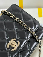 CHANEL PEARL HANDLE FLAP BAG 18 IN BLACK SHINY LAMBSKIN
