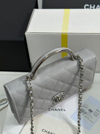 CHANEL FLAP BAG WITH SILVER-TONE HANDLE 19 IN GREY SHINY CAVIAR SKIN
