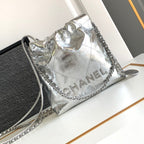 CHANEL 22 BAG IN SILVER SHINY CALFSKIN AND GOLD METAL