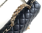 CHANEL MINI 20 FLAP BAG IN BLACK CALFSKIN