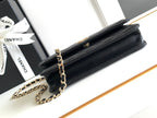 CHANEL 18 FLAP BAG WITH HANDLE IN BLACK CALFSKIN