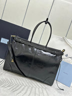 PRADA TOTE BAG WITH BELT 42 IN BLACK OIL WAX LAMBSKIN GOLD HARDWARE