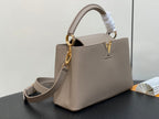 LOUIS VUITTON CAPUCINES MM 31 IN KHAKI BROWN TAURILLON