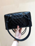 CHANEL 25S  CAMBON BOSTON BAG 27 IN FULL BLACK CALFSKIN